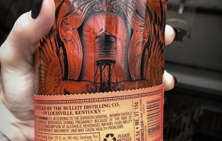 Limited Edition getatoeëerde whiskey fles